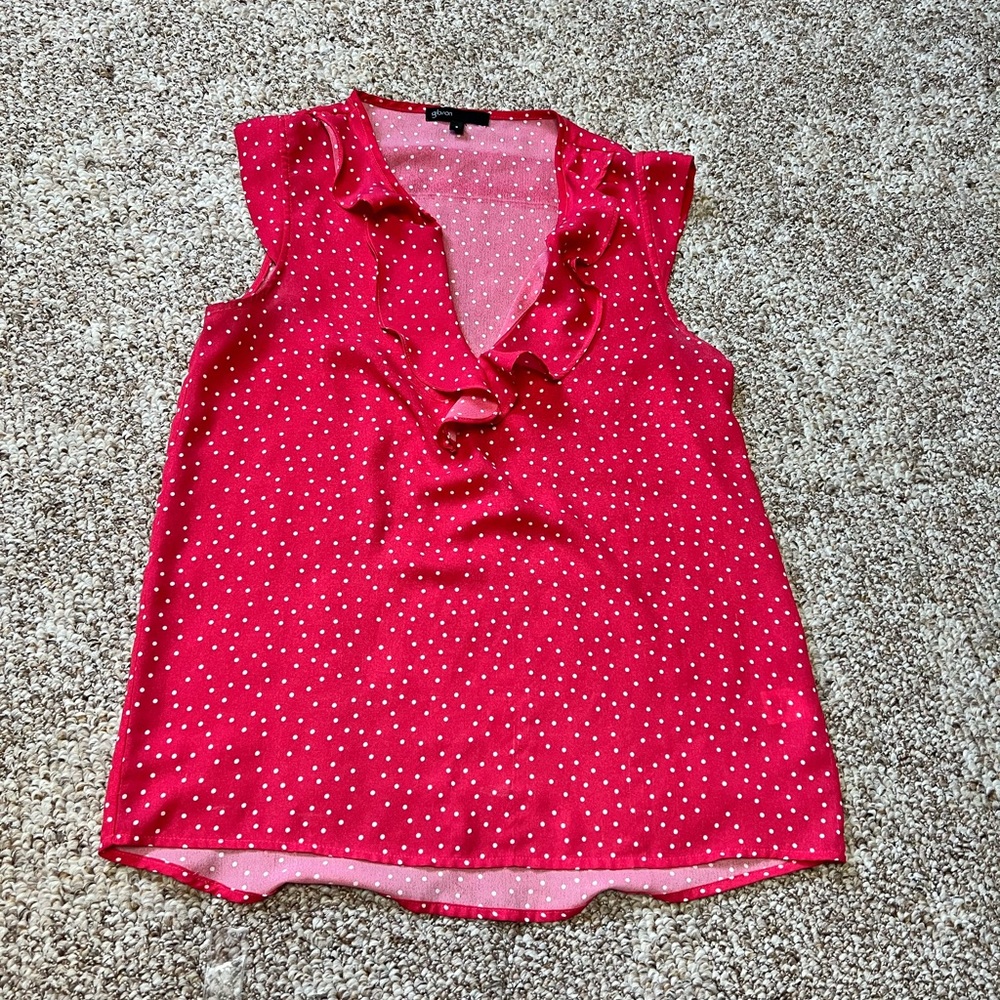 Women’s polka dot ruffled tank top.